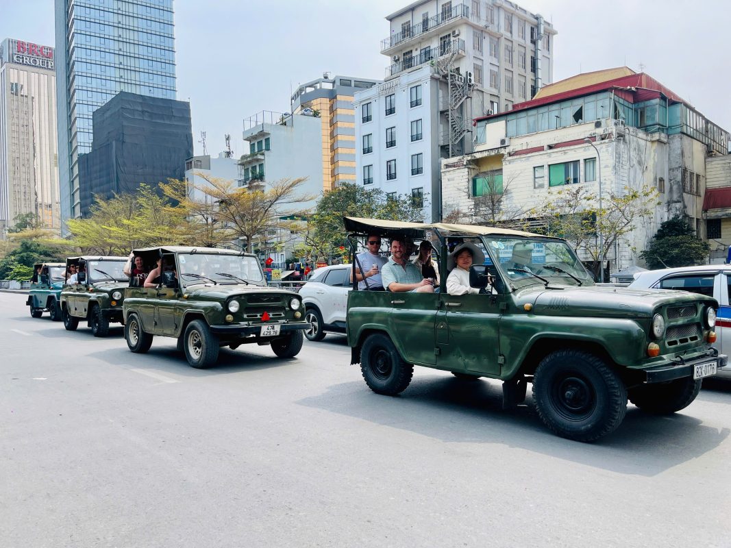 Hanoi Jeep Tour with local guide explaining Vietnamese history