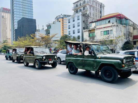 Hanoi Jeep Tour with local guide explaining Vietnamese history